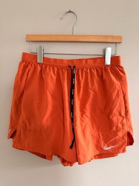 Nike Men's Bright Orange Athletic Shorts with Reflective Swoosh